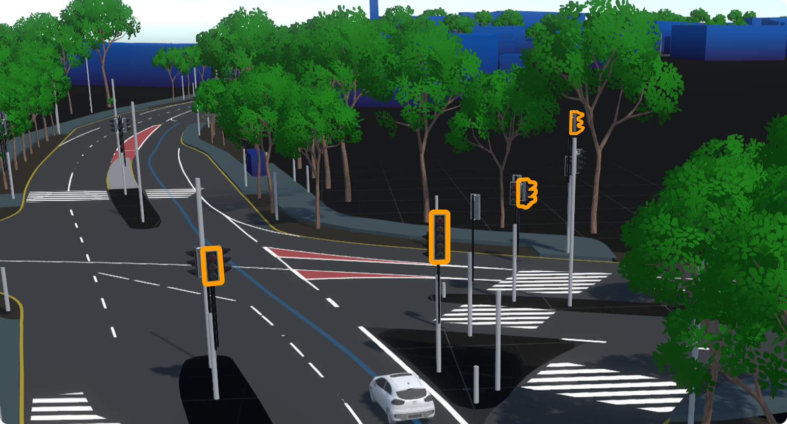 Complex junction in Genie with multiple orange-highlighted traffic signals scattered across the scene